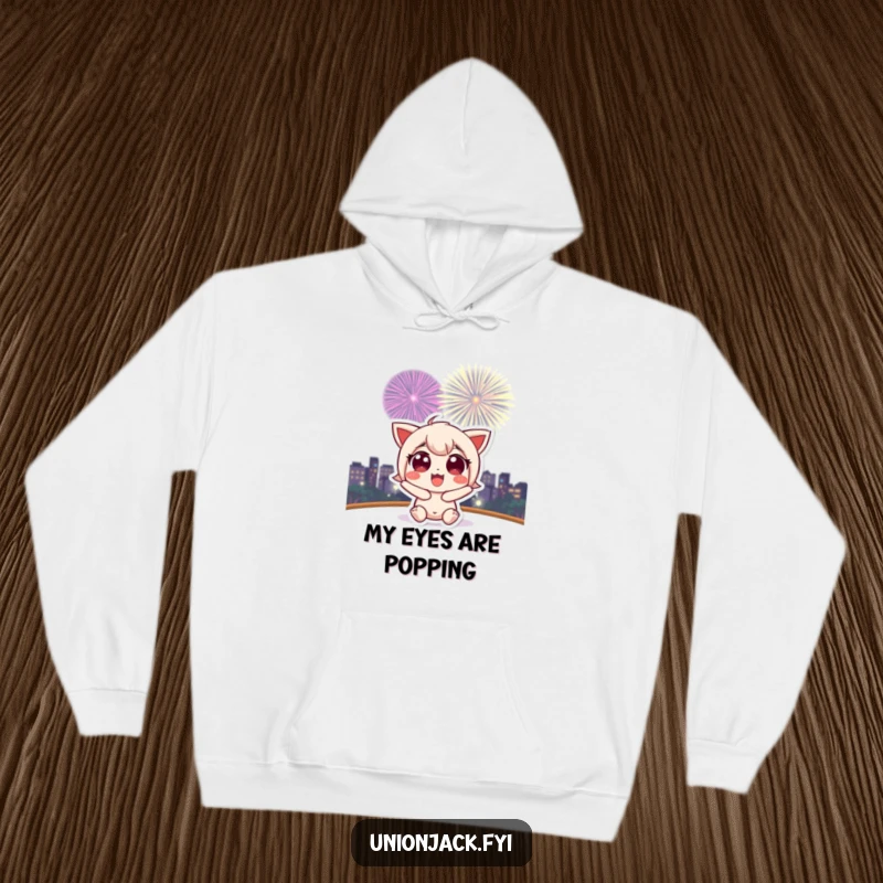 Funny hoodie depicting a cute character with wide, excited eyes gazing at a brilliant fireworks display.